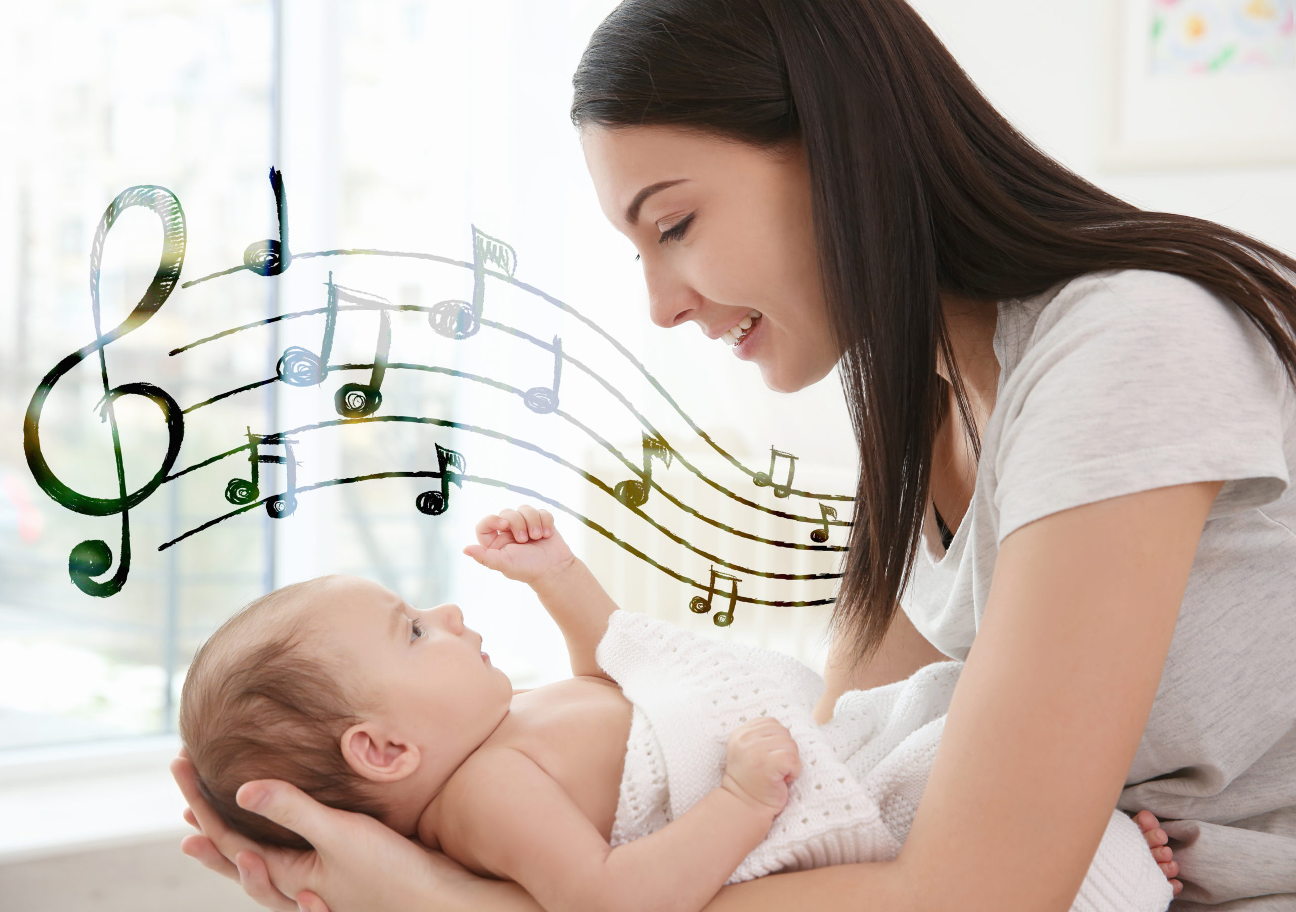 Музыкальные звуки слушать. Мама поет ребенку. Мама поет колыбельную. Мама поет колыбельную ребенку. Мать с ребенком.